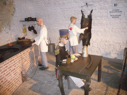 Wax statues at the Dutch Kitchen at the Citadel of Dinant, with explanation