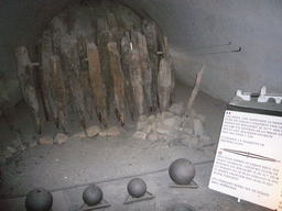 Poles from the first bridge of Dinant at the Citadel of Dinant, with explanation