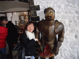 Miaomiao with a wax statue in armour at the Citadel of Dinant