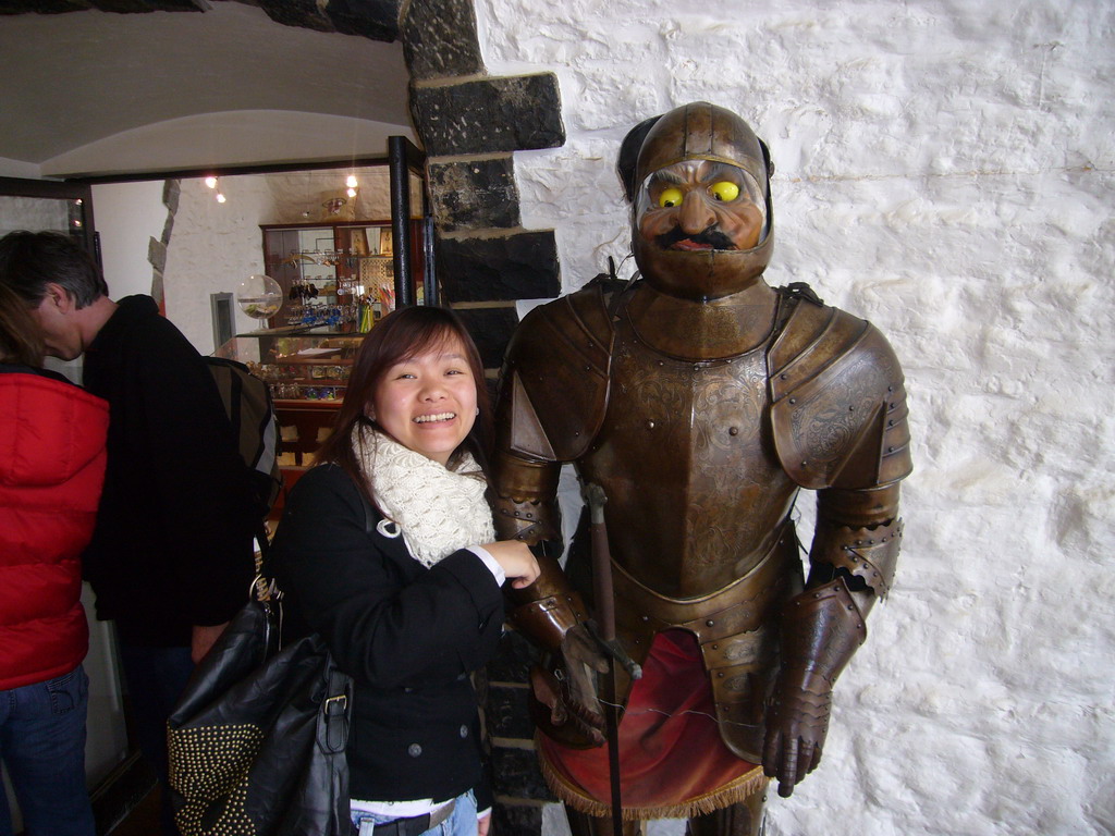 Miaomiao with a wax statue in armour at the Citadel of Dinant