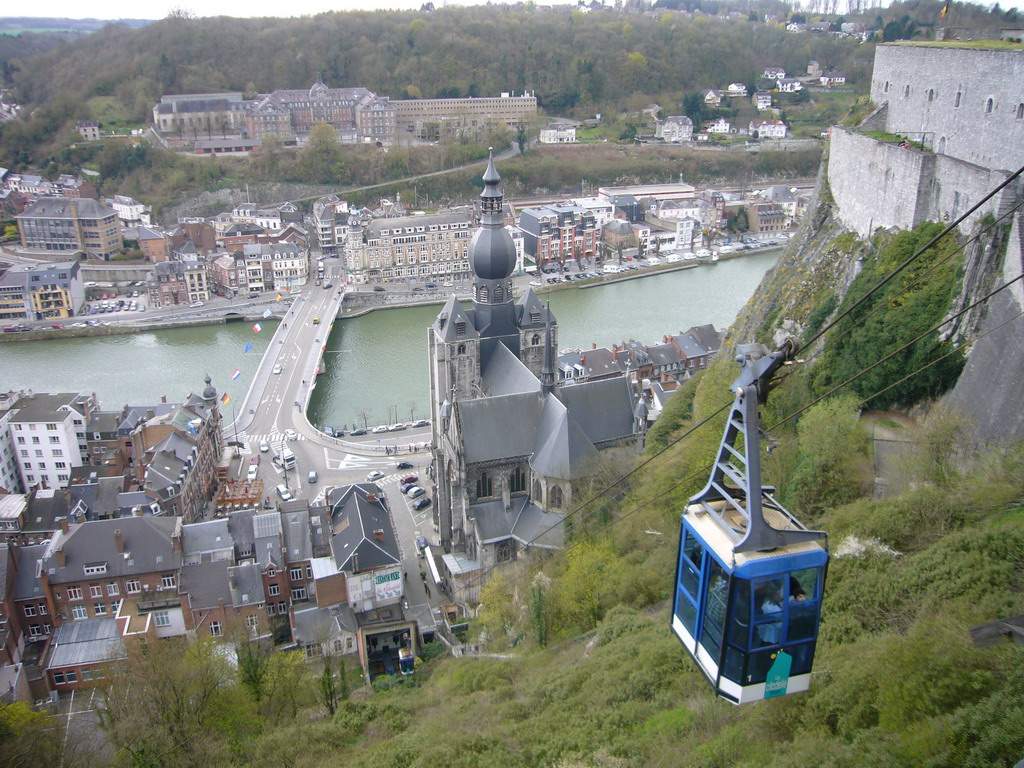 The cable car to the city center with the tower of the Notre Dame de Dinant church, the Pont Charles de Gaulle bridge over the Meuse river and the Collège ND Bellevue school, viewed from the southeast part of the Citadel of Dinant