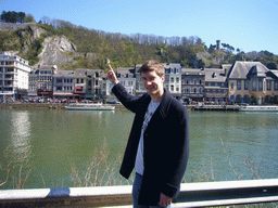 Tim at the Avenue des Combattants with a view on the city center with the Meuse river