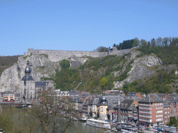 The city center with the Notre Dame de Dinant church, the Citadel of Dinant and the Pont Charles de Gaulle bridge over the Meuse river, viewed from the southwest side of the city