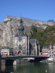 The city center with the Notre Dame de Dinant church, the Citadel of Dinant and the Pont Charles de Gaulle bridge over the Meuse river, viewed from the Rue Francoise Bribosia street