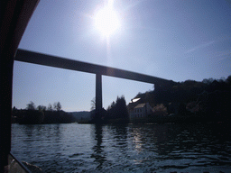 The Route Charlemagne road over the Meuse river, viewed from the tour boat