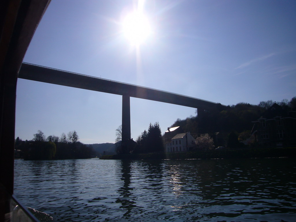 The Route Charlemagne road over the Meuse river, viewed from the tour boat