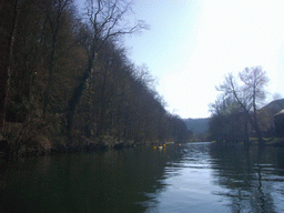 Canoes on the Meuse river, viewed from the tour boat