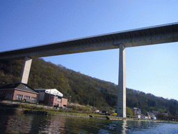 The Route Charlemagne road over the Meuse river, viewed from the tour boat