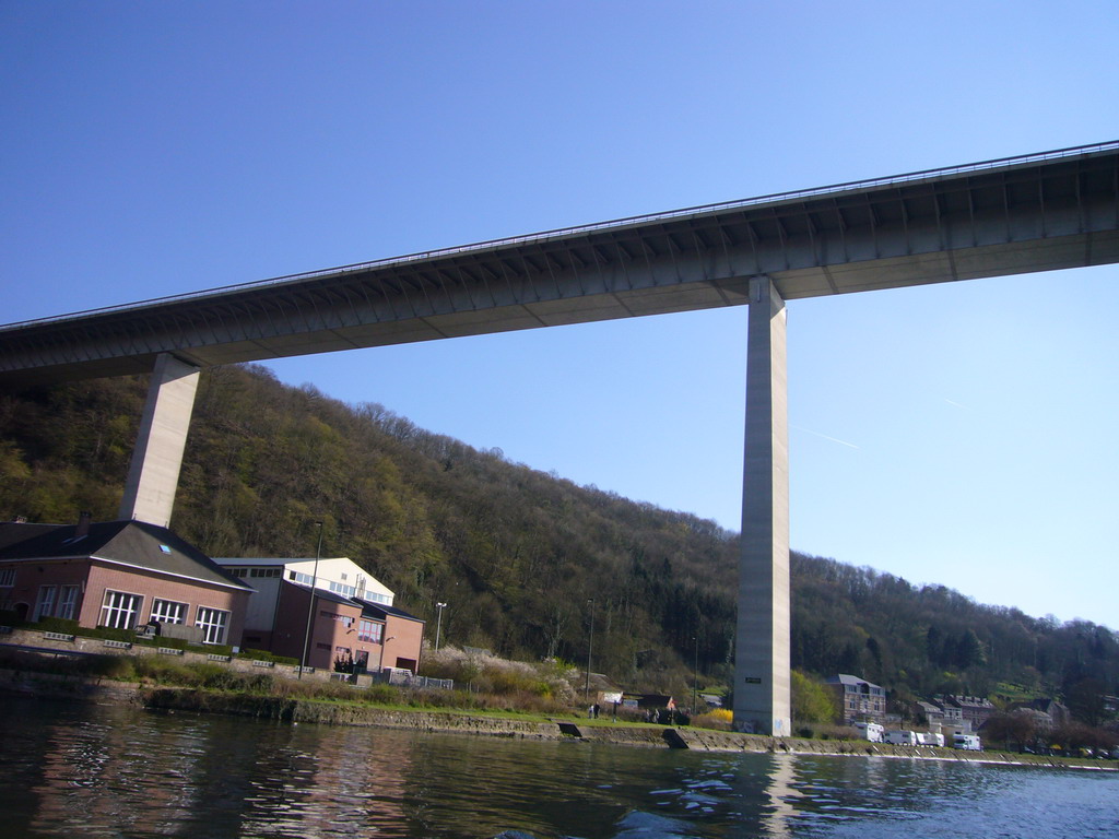 The Route Charlemagne road over the Meuse river, viewed from the tour boat