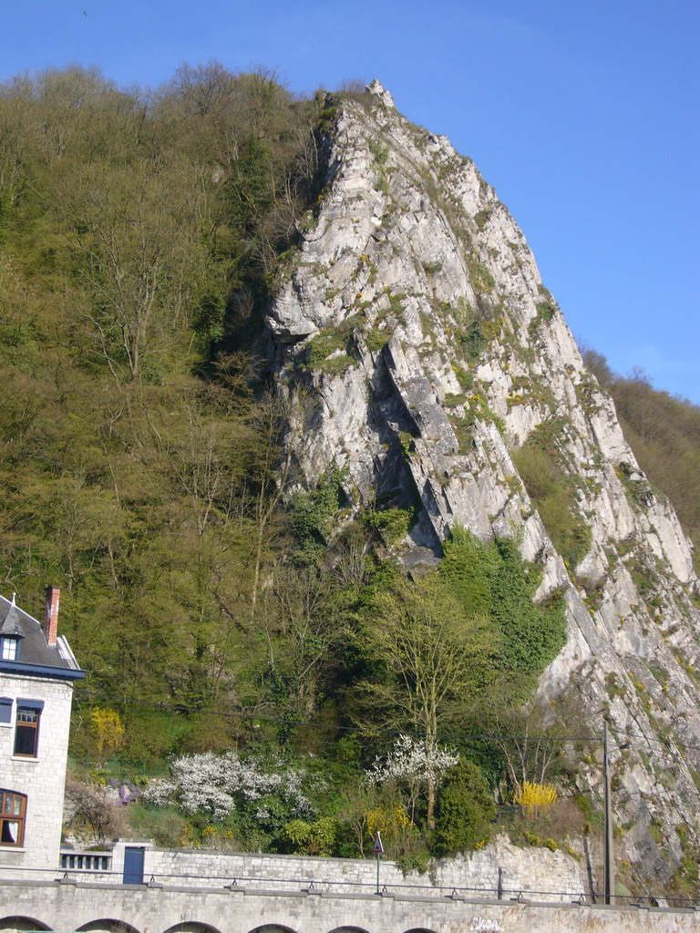 Rock at the Rue des Rivages street and the Meuse river, viewed from the tour boat