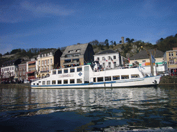 The city center and a boat on the Meuse river, viewed from the tour boat