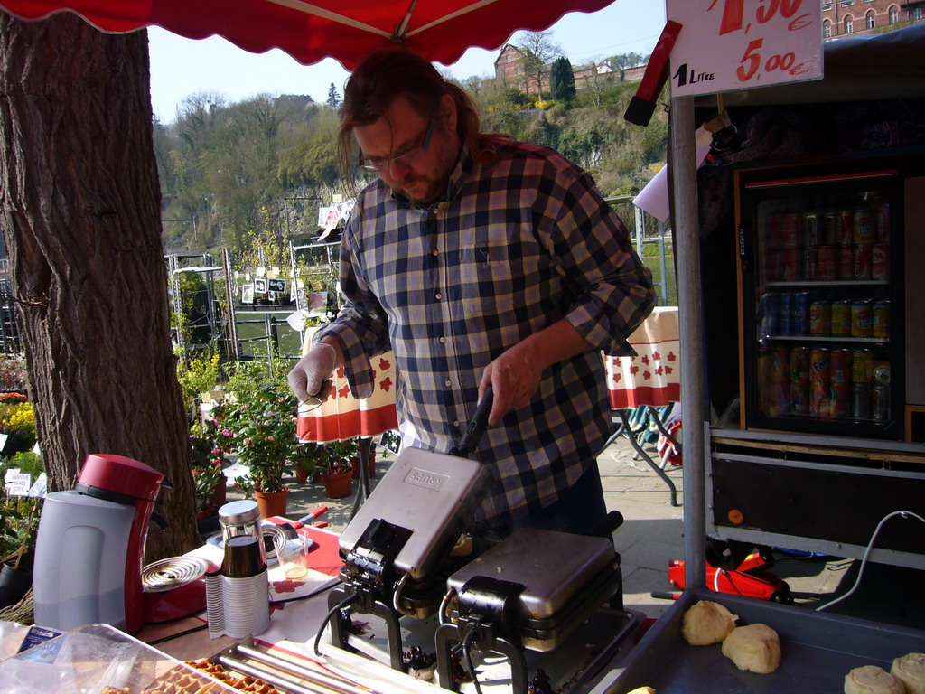 Waffle maker at the flower market at the Avenue Winston Churchill