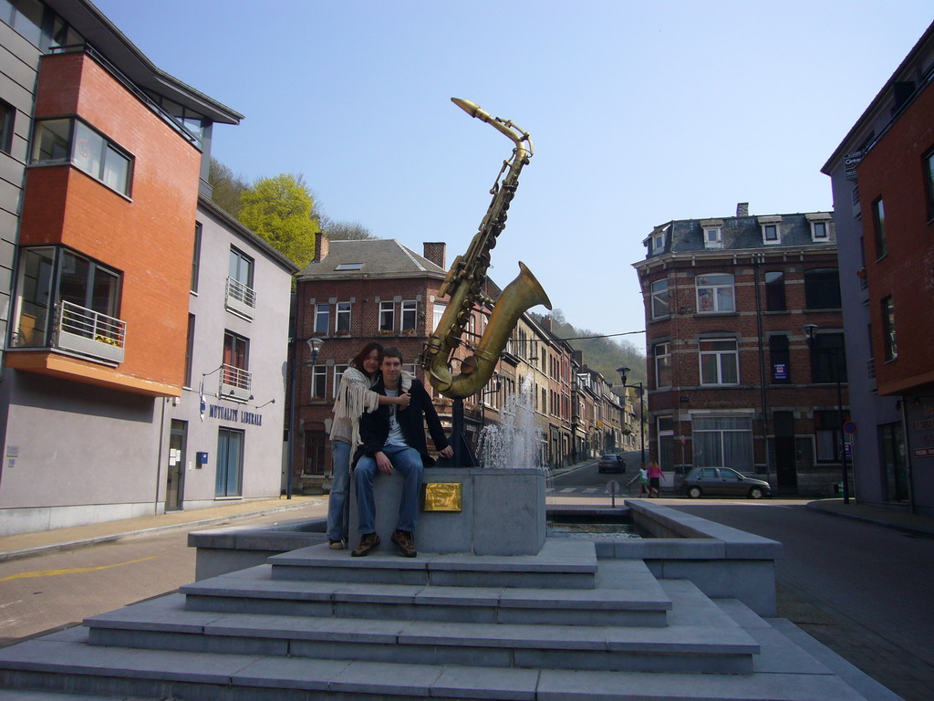 Tim and Miaomiao at the Saxophone Monument at the Rue Saint-Jacques street