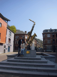 Tim and Miaomiao at the Saxophone Monument at the Rue Saint-Jacques street