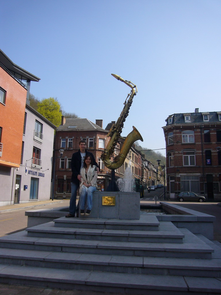 Tim and Miaomiao at the Saxophone Monument at the Rue Saint-Jacques street