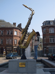 Miaomiao at the Saxophone Monument at the Rue Saint-Jacques street