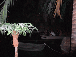 Boat with tourists in Pirates of the Caribbean, viewed from the Blue Lagoon Restaurant, at Adventureland of Disneyland Park