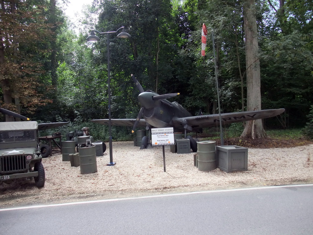 Airplane and jeep from the movie `Pearl Harbor`, at the Studio Tram Tour: Behind the Magic, at the Production Courtyard of Walt Disney Studios Park