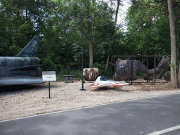 Space shuttle from the movie `Armageddon`, and a dinosaur leg from the movie `Dinosaurs`, at the Studio Tram Tour: Behind the Magic, at the Production Courtyard of Walt Disney Studios Park