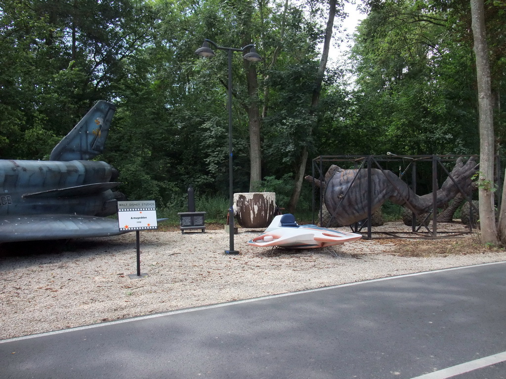 Space shuttle from the movie `Armageddon`, and a dinosaur leg from the movie `Dinosaurs`, at the Studio Tram Tour: Behind the Magic, at the Production Courtyard of Walt Disney Studios Park