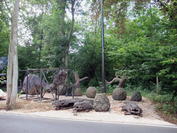 Dinosaur leg and reptiles from the movie `Dinosaurs`, at the Studio Tram Tour: Behind the Magic, at the Production Courtyard of Walt Disney Studios Park