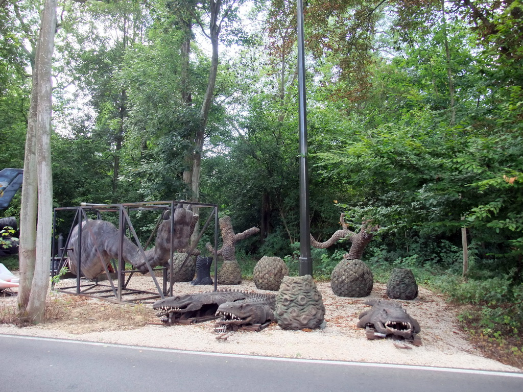 Dinosaur leg and reptiles from the movie `Dinosaurs`, at the Studio Tram Tour: Behind the Magic, at the Production Courtyard of Walt Disney Studios Park