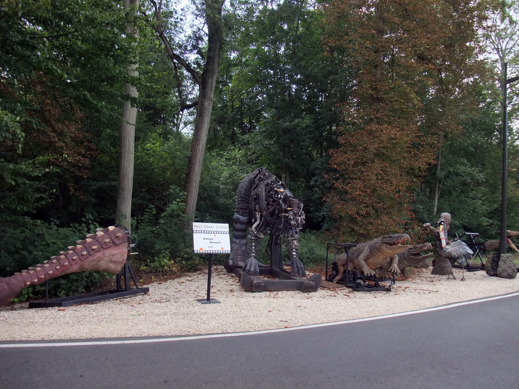 Dinosaur tail, reptiles and bird from the movie `Dinosaurs`, at the Studio Tram Tour: Behind the Magic, at the Production Courtyard of Walt Disney Studios Park
