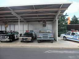 Old cars from the movies `Pearl Harbor` and `Con Air`, and an NYPD car, at the Studio Tram Tour: Behind the Magic, at the Production Courtyard of Walt Disney Studios Park