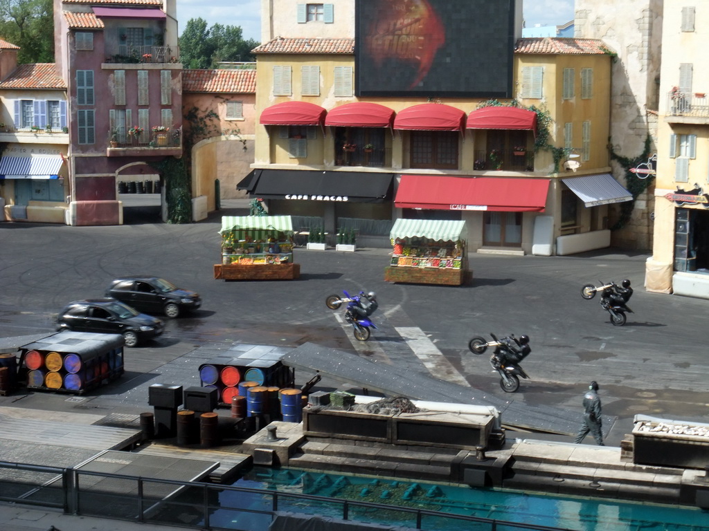 Cars and motorcycles at `Moteurs... Action! Stunt Show Spectacular`, at the Backlot of Walt Disney Studios Park