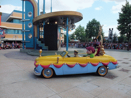 Show White and Dopey in Disney`s Stars `n` Cars parade, at the Production Courtyard of Walt Disney Studios Park