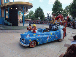 Woody, Jessy, and Mr. and Mrs. Potatohead in Disney`s Stars `n` Cars parade, at the Production Courtyard of Walt Disney Studios Park