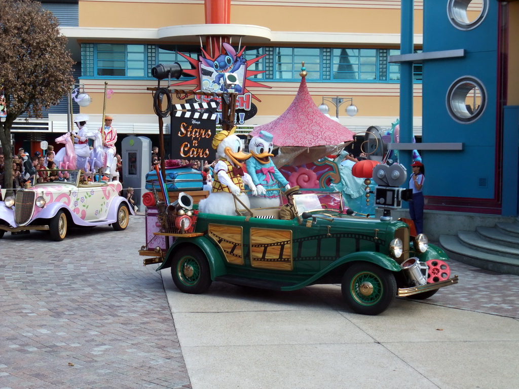Donald and Daisy in Disney`s Stars `n` Cars parade, at the Production Courtyard of Walt Disney Studios Park