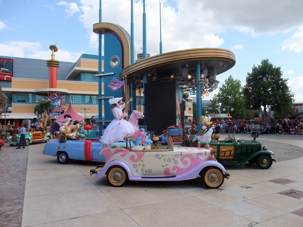 Donald, Mary Poppins, Aladdin and Princess Jasmine in Disney`s Stars `n` Cars parade, at the Production Courtyard of Walt Disney Studios Park