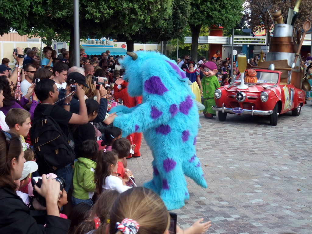 Sulley, Snow White and Dopey in Disney`s Stars `n` Cars parade, at the Production Courtyard of Walt Disney Studios Park