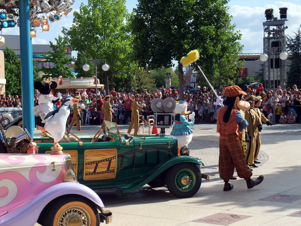 Goofy, Daisy and Minnie in Disney`s Stars `n` Cars parade, at the Production Courtyard of Walt Disney Studios Park