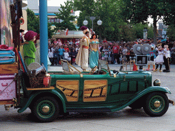 Aladdin, Princess Jasmine, Snow White, Dopey, Daisy, Minnie and Mickey in Disney`s Stars `n` Cars parade, at the Production Courtyard of Walt Disney Studios Park
