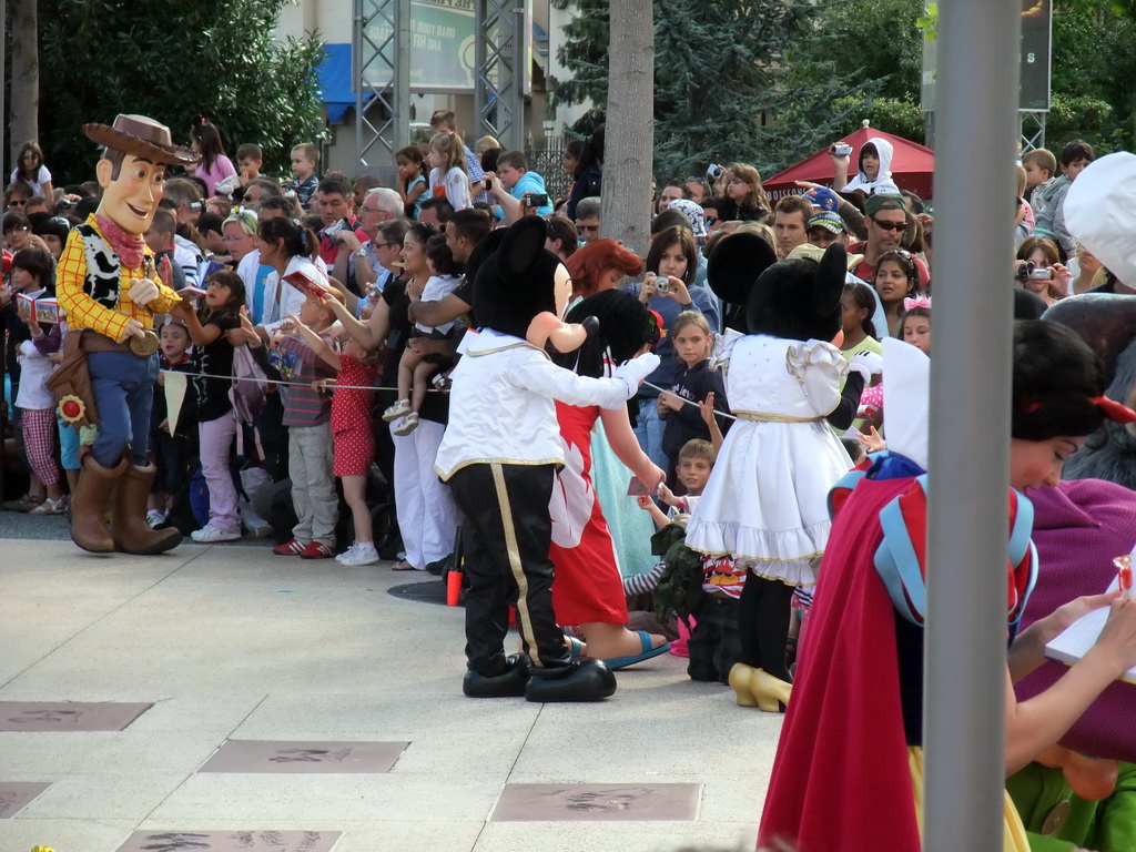 Woody, Mickey, Milo, Minnie and Snow White in Disney`s Stars `n` Cars parade, at the Production Courtyard of Walt Disney Studios Park