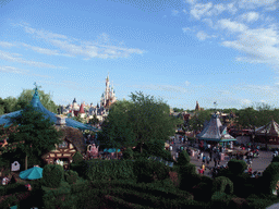 Mad Hatter`s Tea Cups and Sleeping Beauty`s Castle, viewed from the Tower in Alice`s Curious Labyrinth, at Fantasyland of Disneyland Park