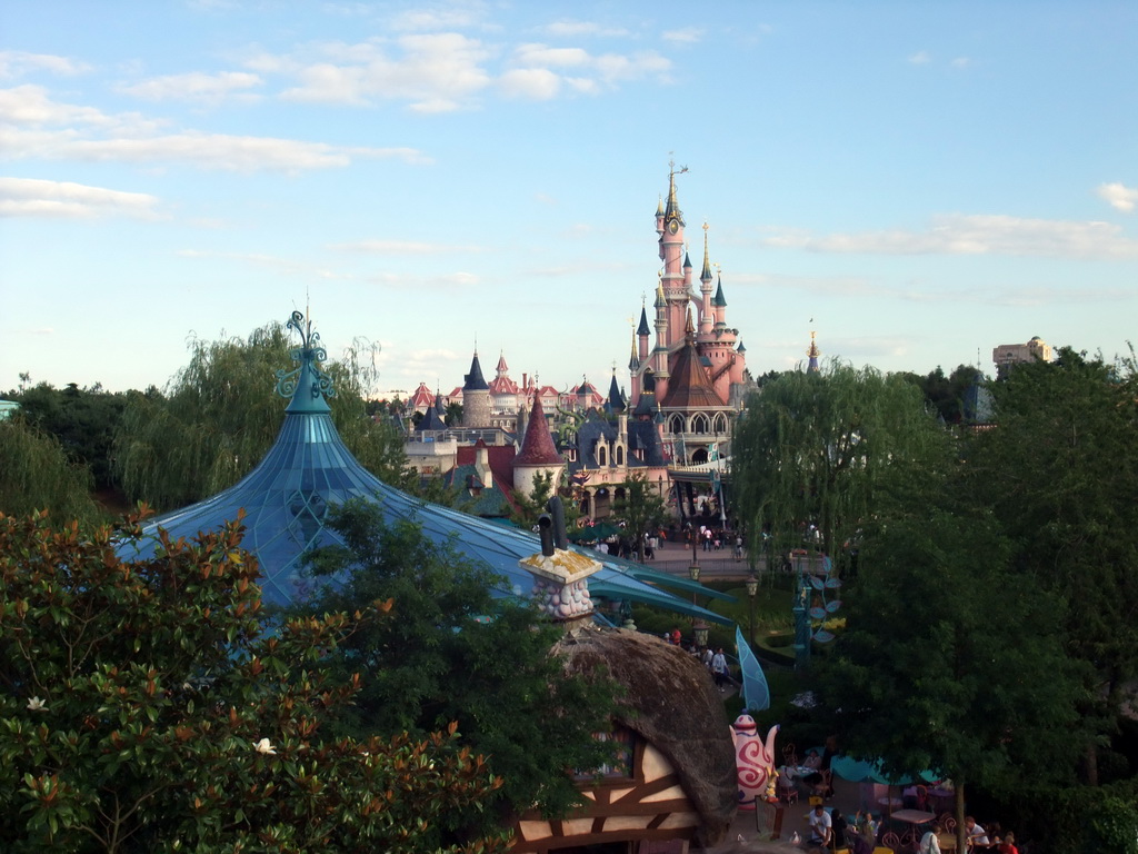 Mad Hatter`s Tea Cups and Sleeping Beauty`s Castle, viewed from the Tower in Alice`s Curious Labyrinth, at Fantasyland of Disneyland Park