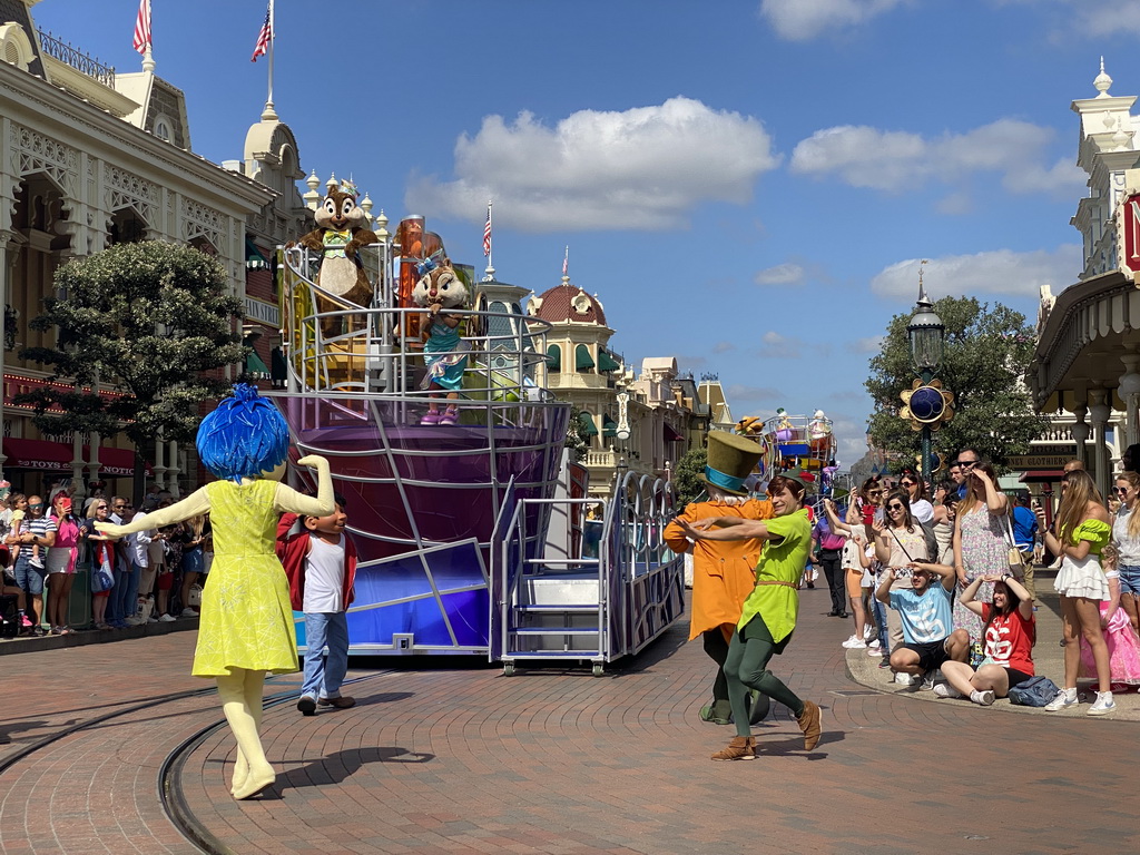 Joy, Miguel, Chip, Clarice, the Mad Hatter, Peter Pan, Pluto, Donald and Daisy at the Disney Stars on Parade at Main Street U.S.A. at Disneyland Park