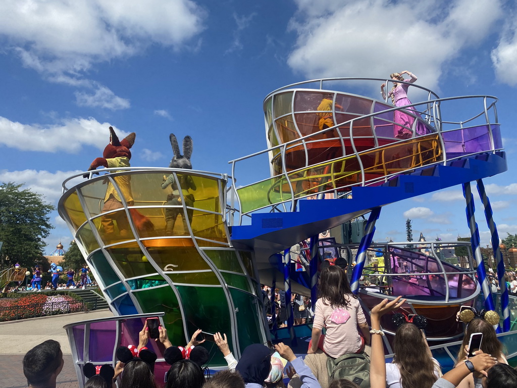 Nick, Judy, Peter Pan, Rapunzel and Joy at the Disney Stars on Parade at Central Plaza and Sleeping Beauty`s Castle at Fantasyland at Disneyland Park