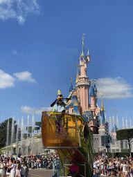 Goofy at the Disney Stars on Parade at Central Plaza and Sleeping Beauty`s Castle at Fantasyland at Disneyland Park