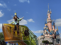 Goofy at the Disney Stars on Parade at Central Plaza and Sleeping Beauty`s Castle at Fantasyland at Disneyland Park
