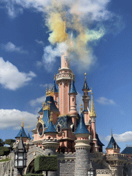 Front of Sleeping Beauty`s Castle at Fantasyland and fireworks at Disneyland Park