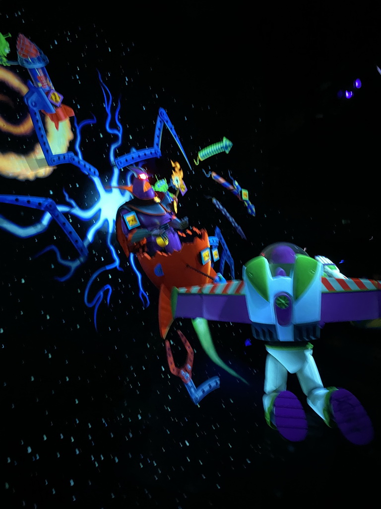 Statues of Buzz Lightyear and Evil Emperor Zurg in a rocket ship at the Buzz Lightyear Laser Blast attraction at Discoveryland at Disneyland Park