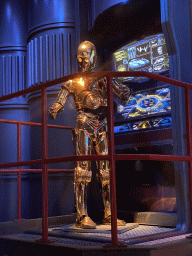 Statue of C-3PO at the queue of the Star Tours - The Adventures Continue attraction at Discoveryland at Disneyland Park