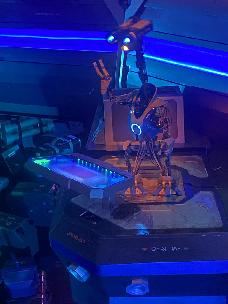 Statue of a droid at the queue of the Star Tours - The Adventures Continue attraction at Discoveryland at Disneyland Park