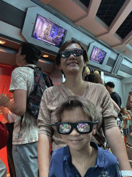 Miaomiao and Max with 3D glasses at the end of the queue of the Star Tours - The Adventures Continue attraction at Discoveryland at Disneyland Park