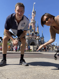 Tim and Miaomiao at Central Plaza with the front of Sleeping Beauty`s Castle at Fantasyland at Disneyland Park