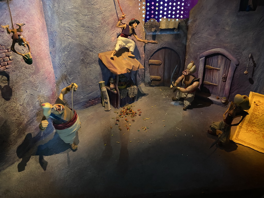 Statues of Aladdin, Abu and bad guys at the Le Passage Enchanté d`Aladdin attraction at Adventureland at Disneyland Park